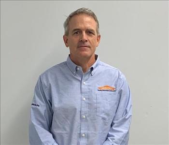 male, blue servpro shirt, front portrait