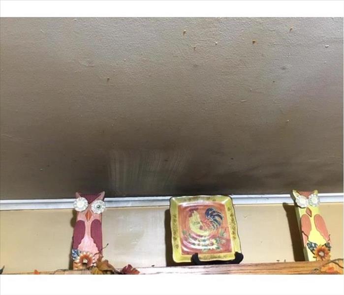 soot film over kitchen range on ceiling 