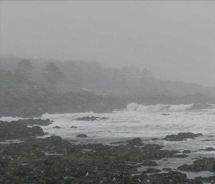 coast line with stormy skies and rough sea