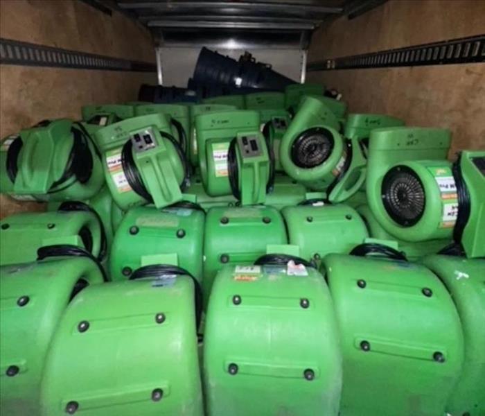 SERVPRO trailer full of equipment ready for work at a flood job-site