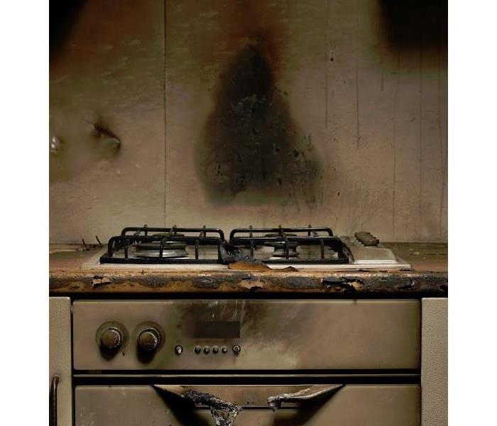 smoke stained kitchen after a stove fire